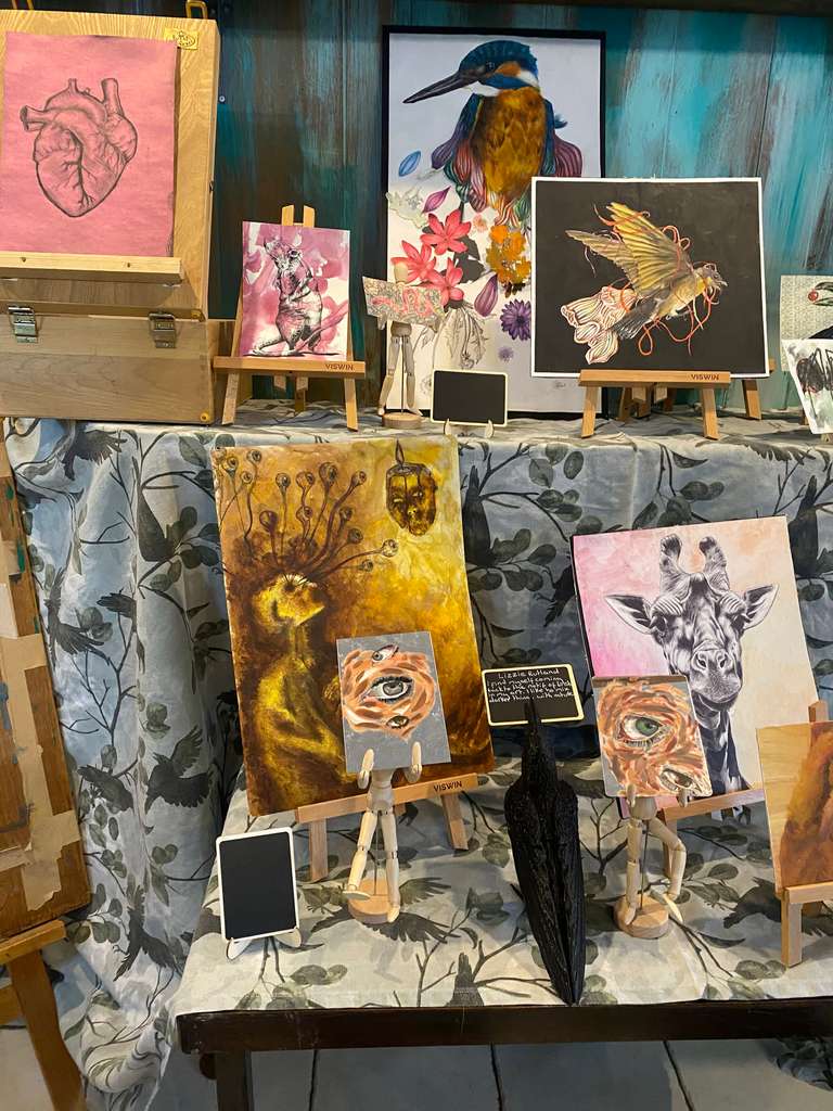 paintings including a giraffe