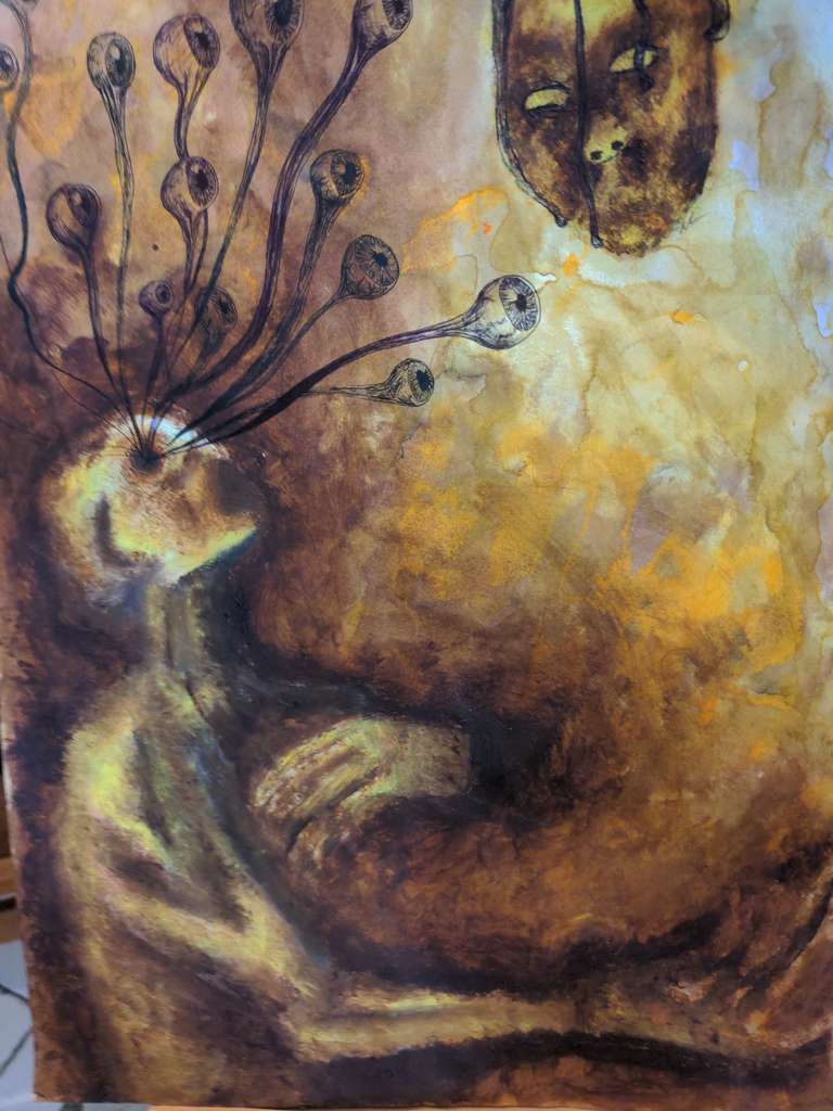 A man with many eyes being pursued by a disembodied face